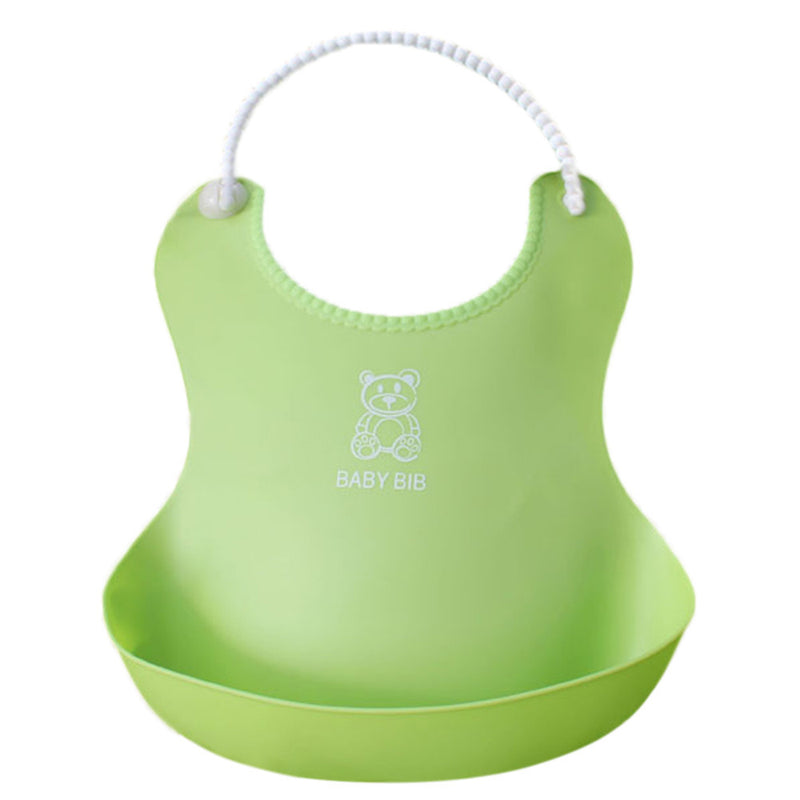 Green silicone baby bib by Baby Bliss Haven, featuring a cute teddy bear design and adjustable neck strap, perfect for feeding infants.